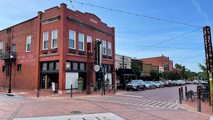Downtown Greer shops, lamp post, parked cars