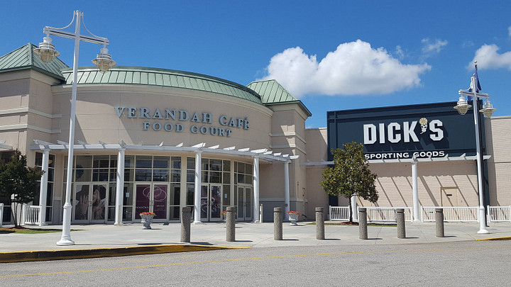 Mall outdoor facade of food court and sporting goods store