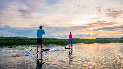 two paddleboarders 